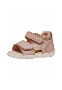 Rosa Geox sandaler med blomsterdesign, åben tå og justerbare velcro-remme. Har en hvid gummisål og metalliske detaljer på hælen.