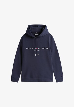 Tamsiai mėlynas džemperis su gobtuvu, pagamintas iš medvilnės mišinio, su priekine kangaroo kišene. Ant jo baltos spalvos užrašas „TOMMY HILFIGER EST. 1985“ ir užtrauktuku su raišteliais.