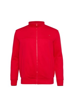 Veste zippée rouge avec col haut, fabriquée en tissu doux. Dispose de deux poches avant et d'un logo minimaliste sur le côté supérieur gauche.
