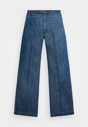 Bredde ben denimjeans i mørkeblå, med høj talje, syninger og to baglommer. Blød tekstur med en let glans.
