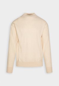 Suéter de punto color crema con un cuello alto, mangas largas y puños acanalados. La tela parece suave con un acabado ligeramente texturizado.