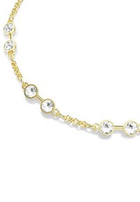 Guldkedja med rund klara kristaller som är inställda i cirkulära fästen, som växlar med länkar och visar en delikat och glänsande design.