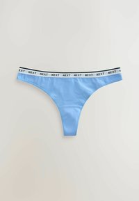 String pour femme en coton bleu clair avec ceinture élastique blanche comportant le texte noir répété "NEXT".