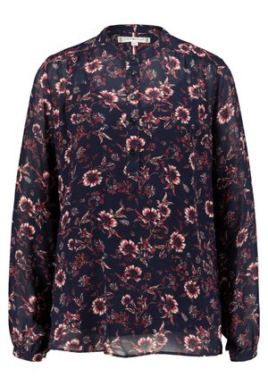 Námorníkově modrá blůza s květinovým vzorem v červené a bílé barvě, dlouhé rukávy, zapínání na knoflíky u krku a průhledná látka s volným střihem.