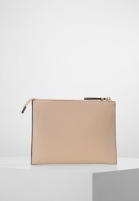 Beige leather pouch with a smooth texture and a top zip closure. Features a subtle embossed pattern on the surface. Rectangular shape.