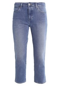 Blå denim korta jeans med klassisk passform, fem-fickorsdesign och knäppning i midjan. Ljus tvätt med subtila blekningar.