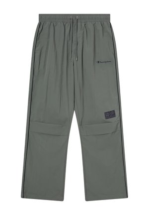 Pantalones ligeros de color verde oliva con cintura elástica, detalle de cordón, bolsillos laterales, costuras negras y un parche con logo.