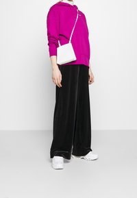 Nike Sportswear Mikina s kapucí - pink