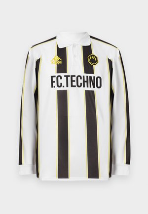 Langemouw voetbalshirt met witte en zwarte verticale strepen, voorzien van een gele accent, kraag, logo en de tekst "F.C.TECHNO".