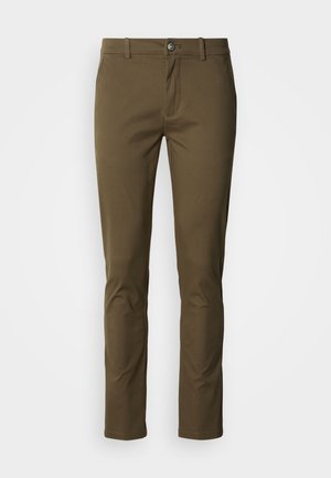 Brown cotton trousers with a slim fit, featuring a button fly, side pockets, and clean lines. Smooth texture with minimal stitching details.
