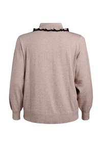 Pullover in khaki con colletto e rifinitura a volant nera. Il materiale è morbido, con maniche lunghe e polsini e bordo a costine.