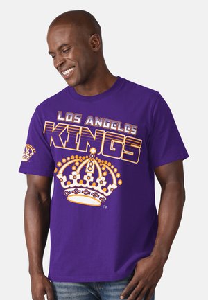 Lila Baumwoll-T-Shirt mit der Aufschrift "LOS ANGELES KINGS" in fett-orangener Schrift und einem weißen Kronen-Graphic auf der Vorderseite und dem Ärmel.