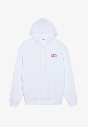 Valkoinen huppari, jossa on etutasku, nyöripäällinen huppu ja värikäs tekstigrafiikka rinnassa. Pehmeää puuvillakangasta, jossa ribbireunat.