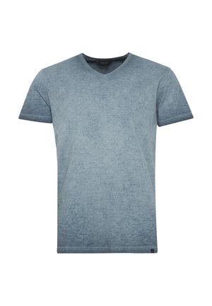 T-shirt s V-izrezom u gradijentnoj plavoj boji s mekanom teksturom. Kratki rukavi, ležeran rez i suptilna oznaka branda na rubu.