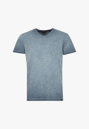 V-Ausschnitt T-Shirt in einem Farbverlauf von Blau mit weicher Textur. Kurze Ärmel, legerer Schnitt und dezentem Markenetikett am Saum.