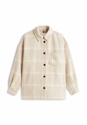 Giacca camicia a scacchi beige realizzata in tessuto morbido, con chiusura a bottoni, bottoni neri, colletto da camicia e taschino sul petto.