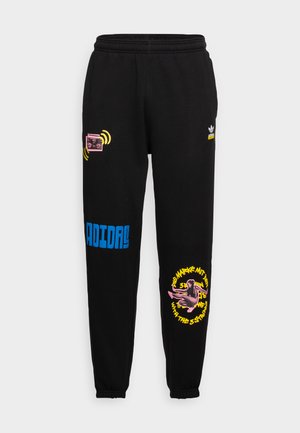 UNITE UNISEX - Tracksuit bottoms - black