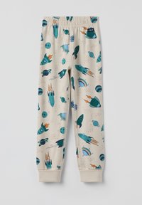 Beige Hosen für Kinder mit bunten Raketen- und Planetenmotiven, aus weichem Stoff gefertigt, mit elastischem Bund und gerippten Bündchen.