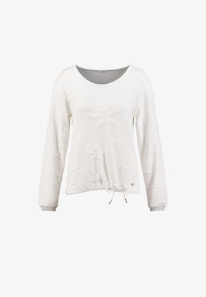 Maglietta bianca a maniche lunghe con motivo a stelle, colletto tondo e orlo regolabile con coulisse. Presenta un tessuto testurizzato e accenti a contrasto nei polsini.
