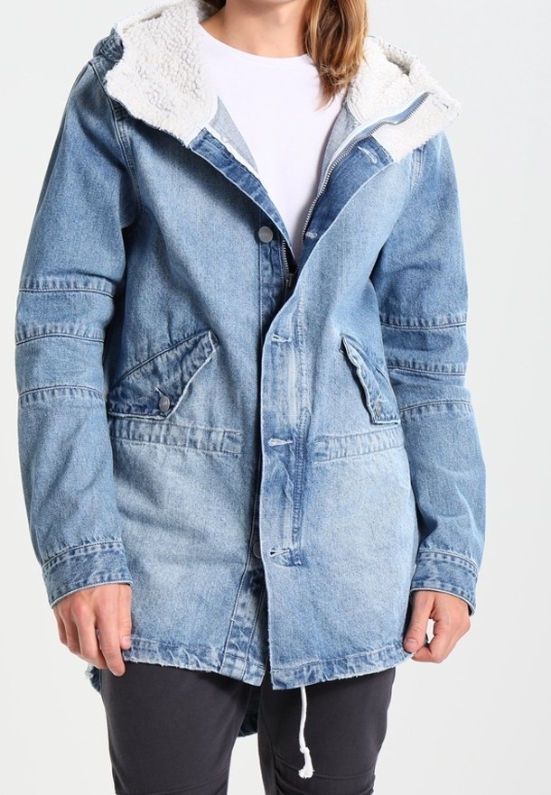 Blue denim jacket with a sherpa-lined hood, button closures, two front pockets, and drawstring hem. Features a faded wash and textured fabric.