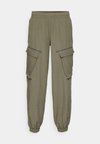 UNSTOPPABLE - Pantalones - marine green/black