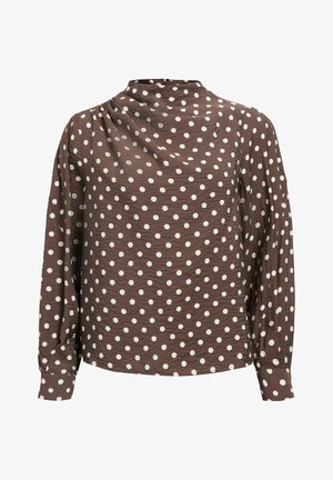 Bruine blouse met lange mouwen, voorzien van witte polkadots, licht gestructureerde stof, hoge halslijn en knoopsluitingen bij de manchetten.