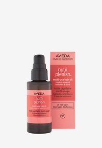 Huile capillaire multi-usage Nutri Plenish dans un flacon en verre foncé avec un diffuseur noir, arborant une étiquette et un packaging rose corail pour hydrater et faire briller les cheveux.