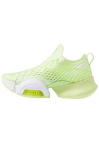 Vaaleanvihreät urheilukengät, joissa on hengittävä verkko-osa, valkoiset yksityiskohdat, erottuva pyöreä pohja ja näkyvä ilmapatja kantapäässä.