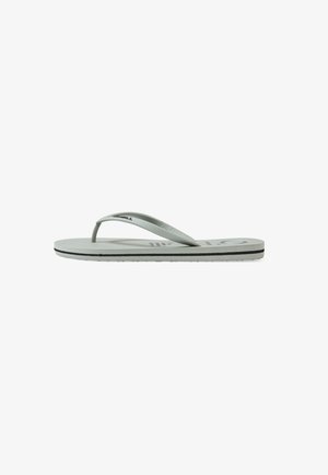 Light green flip-flop with a flat sole, thin straps, and textured footbed. Features a black accent line along the edge, PVC-free material.