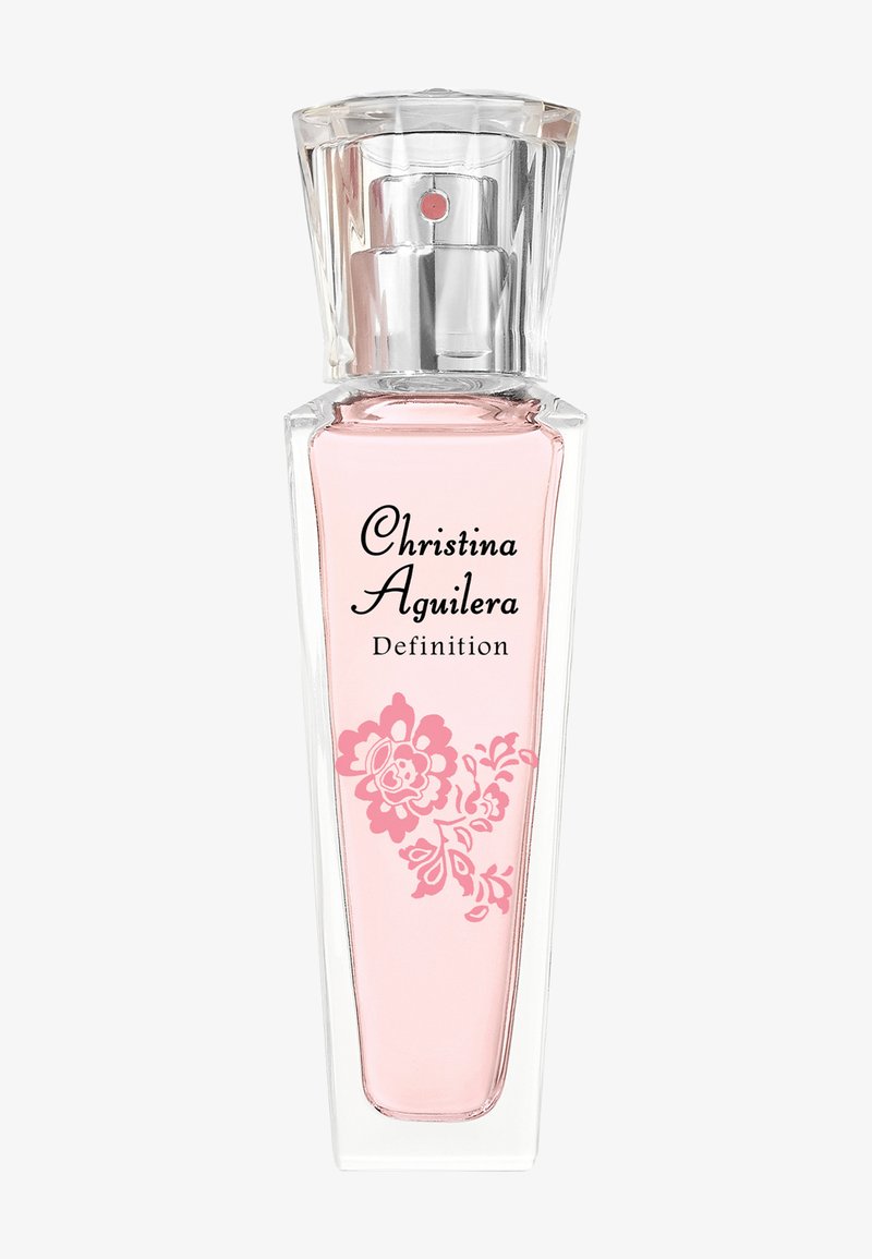 Flacon de parfum transparent avec liquide rose, vaporisateur argenté, motif floral et étiquette indiquant "Christina Aguilera Definition."