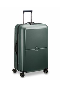 Valise rigide vert profond, avec une surface texturée, une poignée rétractable noire, des roues doubles et un design épuré.