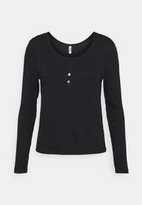 Svart långärmad tröja med ribbad textur, rund halsringning och treknapplås. Enkelt design med åtsittande ärmar.