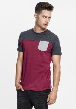 Men's crew neck t-shirt featuring a maroon body, dark gray sleeves, and a light gray chest pocket. Cotton fabric with a smooth texture.
