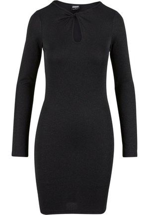 Abito nero a maniche lunghe con silhoutte aderente, dettaglio a chiave nell'area del collo e una leggera texture lucida. Rifinitura del tessuto liscia.