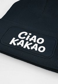 Navy knitted beanie featuring a textured ribbed design and a rectangular patch with the white text “Ciao Kakao.”