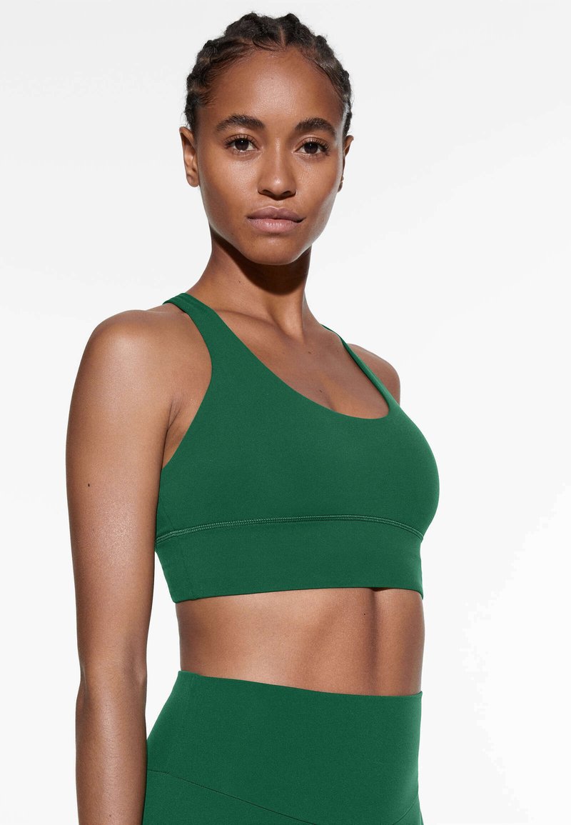 OYSHO MEDIUMSUPPORT SPORTS WITH CUPS Bustier dark green Zalando.de