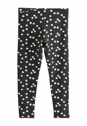 Colanți negri cu buline albe, realizați dintr-un material elastic, cu talie elastică și design slim, ajustat.