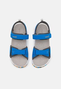 Superfit CRISS CROSS UNISEX - Vaellussandaalit - blau/orange