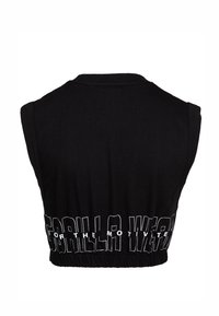 Zwart cropped tanktop met een ronde halslijn en mouwloos ontwerp. Voorzien van een aangesnoerde zoom en gedurfde witte tekst op de achterkant.