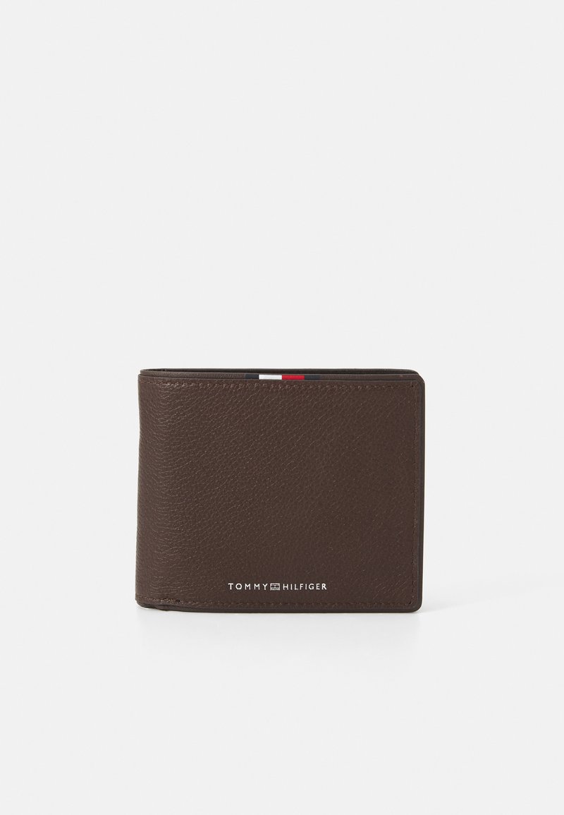 Brown leather wallet with textured surface, bi-fold design, and white branded logo. Interior features red, white, and blue accents.