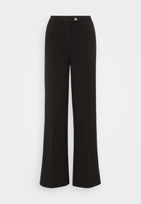 Pantalons larges noirs avec une texture lisse, dotés d'une fermeture à bouton sur le devant et de lignes épurées, offrant une silhouette ajustée.