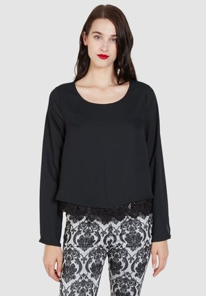 CON DETALLE DE ENCAJE EN EL BAJO - Blusa - negr