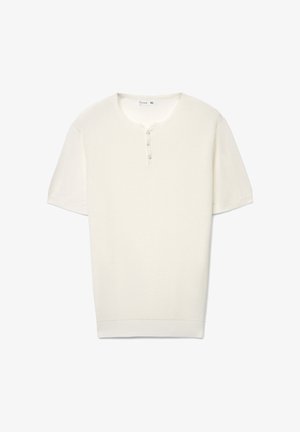 Maglietta a maniche corte in stile henley color bianco sporco, con corpo testurizzato e patta con tre bottoni. Tessuto morbido con orlo sagomato.