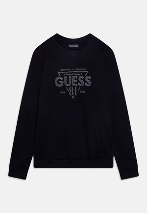 Sweat-shirt noir à manches longues avec le logo "GUESS 81" et le texte "Established in California" en gris sur la poitrine, avec poignets et ourlet côtelés.