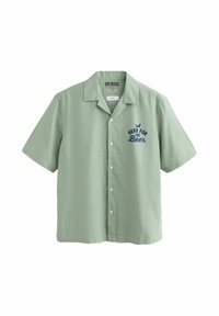 Short-sleeve green button-up shirt in a lightweight fabric featuring navy text "HERE FOR Beer" with a decorative accent above.