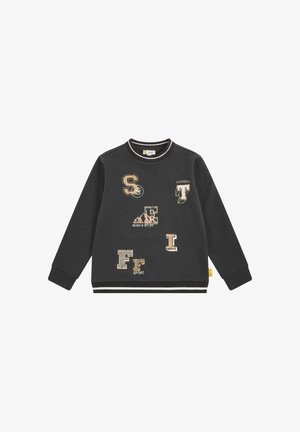 Felpa nera con maniche lunghe, collo rotondo e polsini a costine. Presenta toppe testurizzate e testo stampato in beige, inclusa la parola "DOWNHILL."