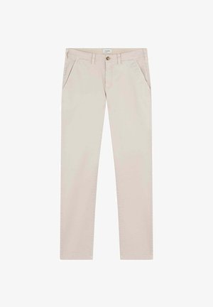 Beżowe bawełniane chinosy o dopasowanym kroju, z dwoma bocznymi kieszeniami, zapięciem na guzik oraz subtelnymi detalami przeszycia wzdłuż szwów.