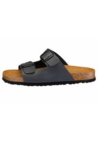 Black leather buckle slide sandal with a cork footbed, flat sole, and textured rubber outsole. Open-toe design with two adjustable straps.