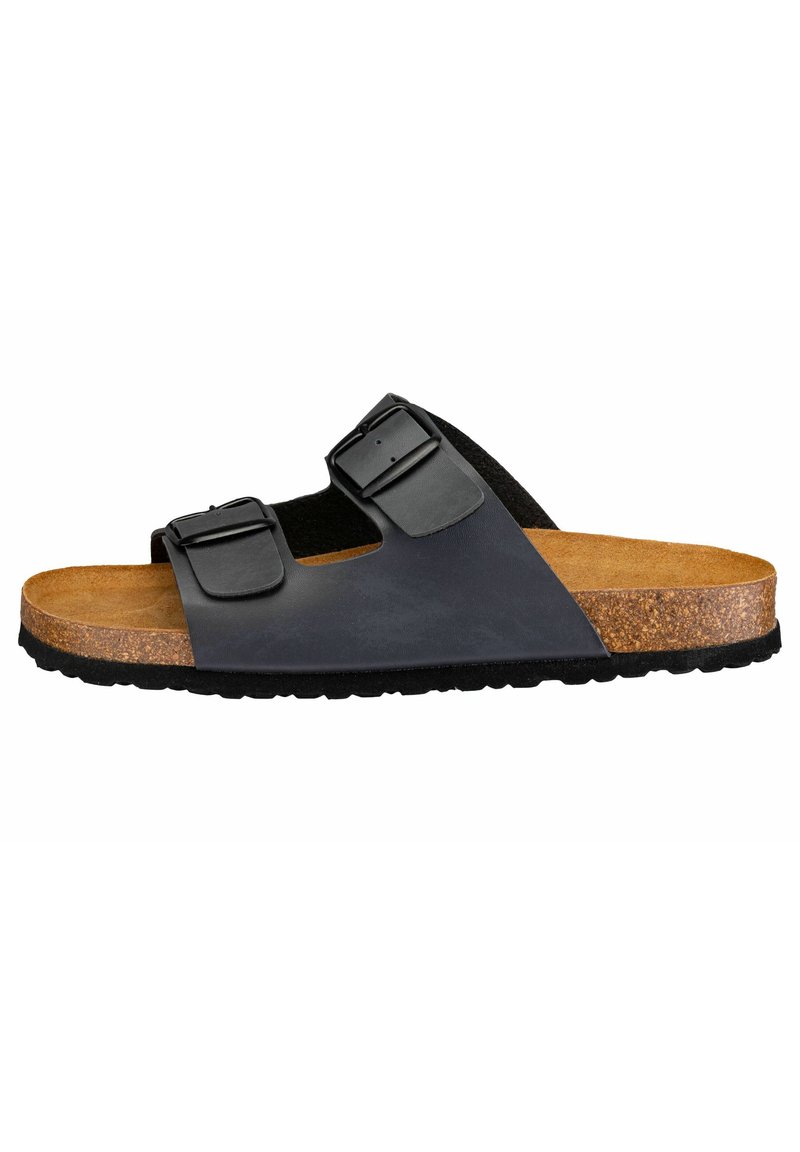 Black leather buckle slide sandal with a cork footbed, flat sole, and textured rubber outsole. Open-toe design with two adjustable straps.