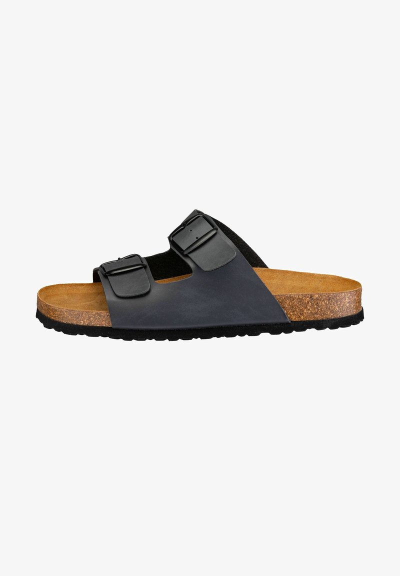 Black leather buckle slide sandal with a cork footbed, flat sole, and textured rubber outsole. Open-toe design with two adjustable straps.